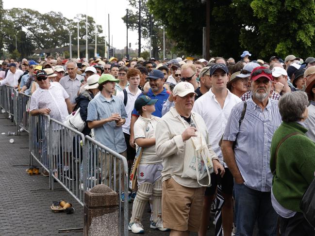 Fans and member line up before day one of the Fifth Test. Picture: Darrian Traynor/Getty Images