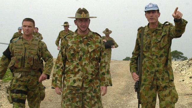 Then chief of army Peter Cosgrove, centre, on a tour of strategic locations in Balibo, East Timor in 2001.