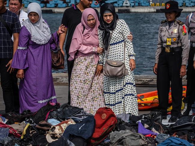 ***BESTPIX*** JAKARTA, INDONESIA - OCTOBER 31: Families of the victims of Lion Air flight JT 610, visit an operations centre to look for personal items of their relatives, at the Tanjung Priok port on October 31, 2018 in Jakarta, Indonesia. Rescuers have recovered bodies, body parts, and personal items in the wreckage, with all 189 passengers and crew feared dead. Lion Air Flight JT 610, travelling from Jakarta to Pangkal Pinang crashed in the Java sea on Monday morning shortly after takeoff. (Photo by Ulet Ifansasti/Getty Images)