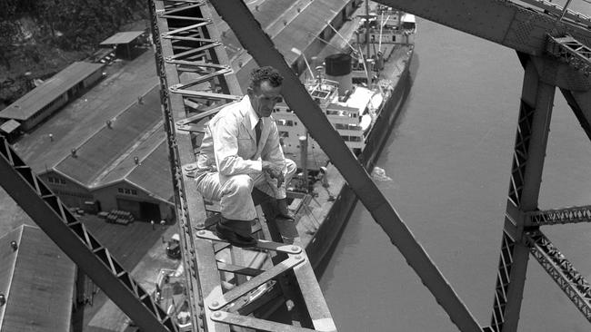 A painter working on the Story Bridge in 1959.