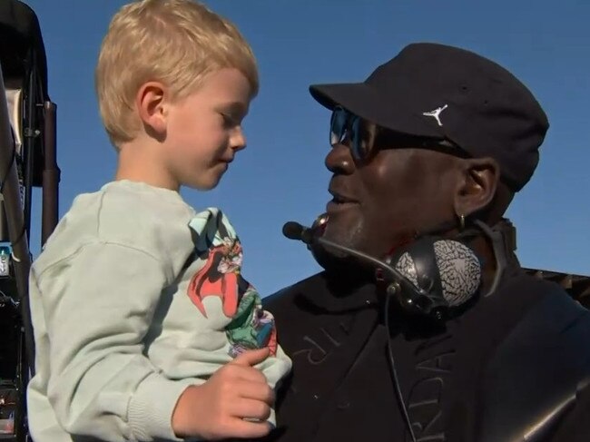 Michael Jordan celebrates with Tyler Reddick's son.