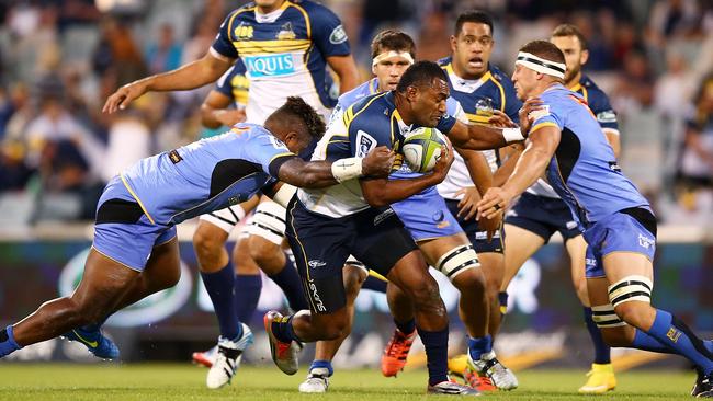 Tevita Kuridrani of the Brumbies is tackled.