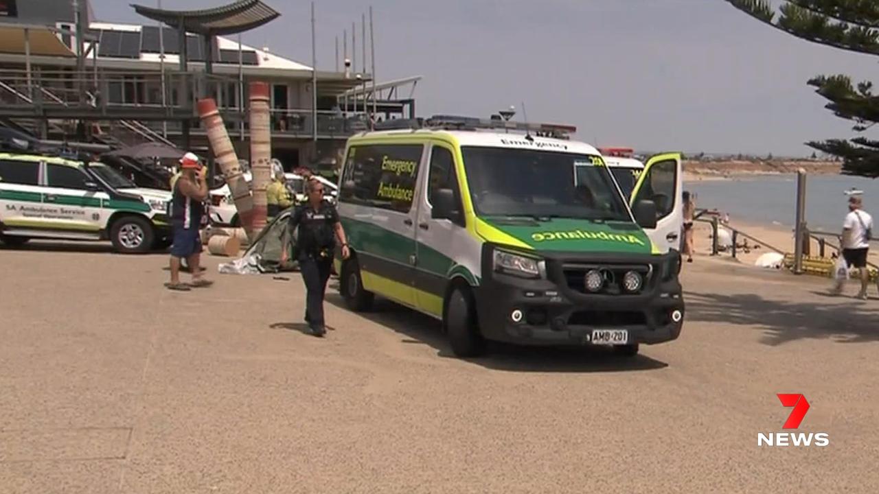 An ambulance at Port Noarlunga after the reported shark attack. Picture: 7 NEWS