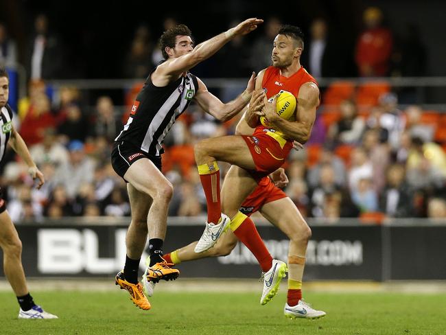 Suns Andrew Raines in action in the Suns vs Collingwood game at Metricon Stadium on Saturday. Picture: JERAD WILLIAMS