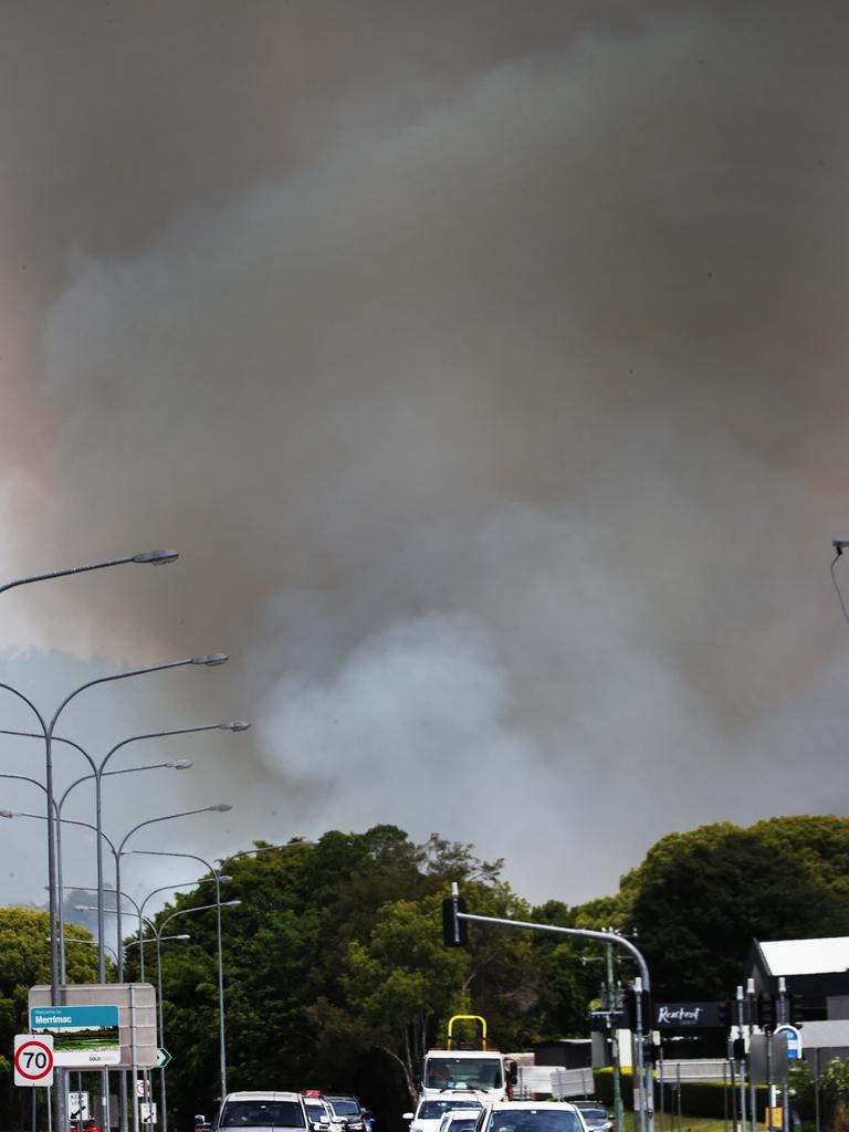 Grass Fires in the Carrara and Merrimac area kept Emergency Services and residents on alert during Tuesday. Picture Glenn Hampson