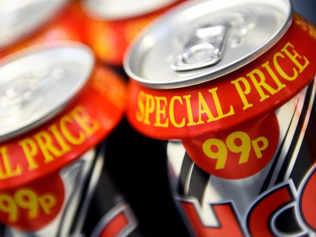 Price tags announcing special prices are displayed at a liquor store in Glasgow on November 15, 2017.  Britain's top court on November 15, 2017, supported the Scottish government's innovative plan to stop people "drinking themselves to death" by imposing a minimum price on alcohol. / AFP PHOTO / ANDY BUCHANAN