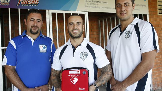 A defibrillator was donated to the OLQP Falcons at Daniel Street Park at Greystanes by the Marc Arcuri Foundation and Royal Life Saving NSW in 2016. From left: Falcons Club president Simon Semaan with Robby Mansour and Alex Cauchi from the foundation.