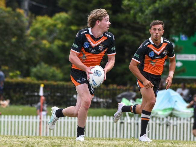 Cohen Benson in action for the Balmain Tigers SG Ball side. Picture: Shot of Guac Photography