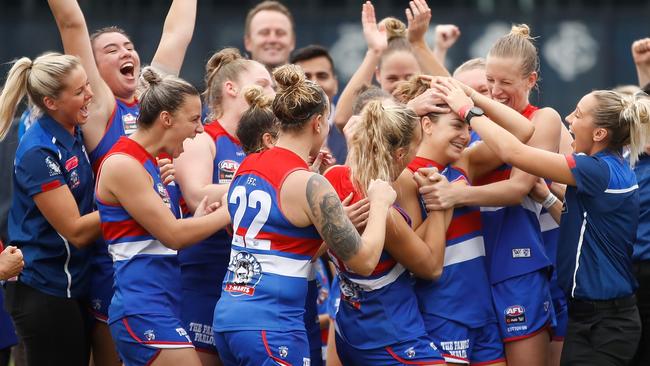 The Western Bulldogs celebrate their premiership win over the Brisbane Lions in March, but the women’s game is full of anger and frustration as a third season looms. Picture: Getty Images