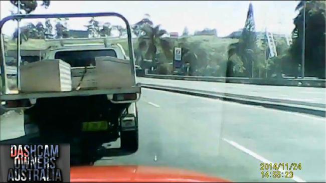 After hitting the car on the inside lane the ute driver continues on his way. Picture: Dash Cam Owners Australia / Facebook