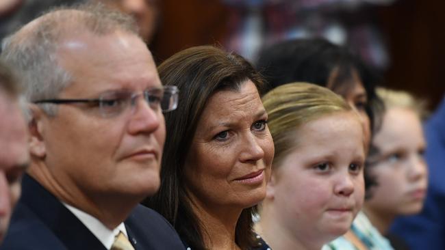 Prime Minister Scott Morrison and wife Jenny Morrison and his daughters during Mass at St Mark Coptic Orthodox Church at Arncliffe in Sydney.