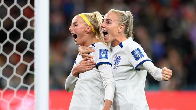 Chloe Kelly (L) and Alex Greenwood (R) celebrate England’s dramatic victory. Picture: Getty