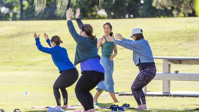 A group of women exercise at Broadbeach. Picture: NIGEL HALLETT