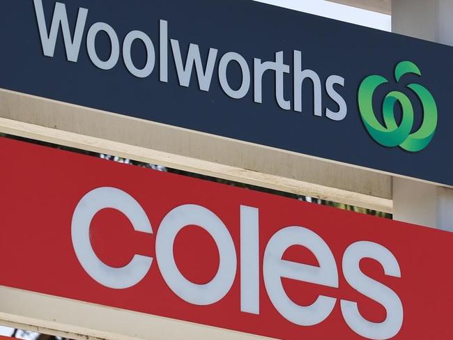 coles and woolies signs together