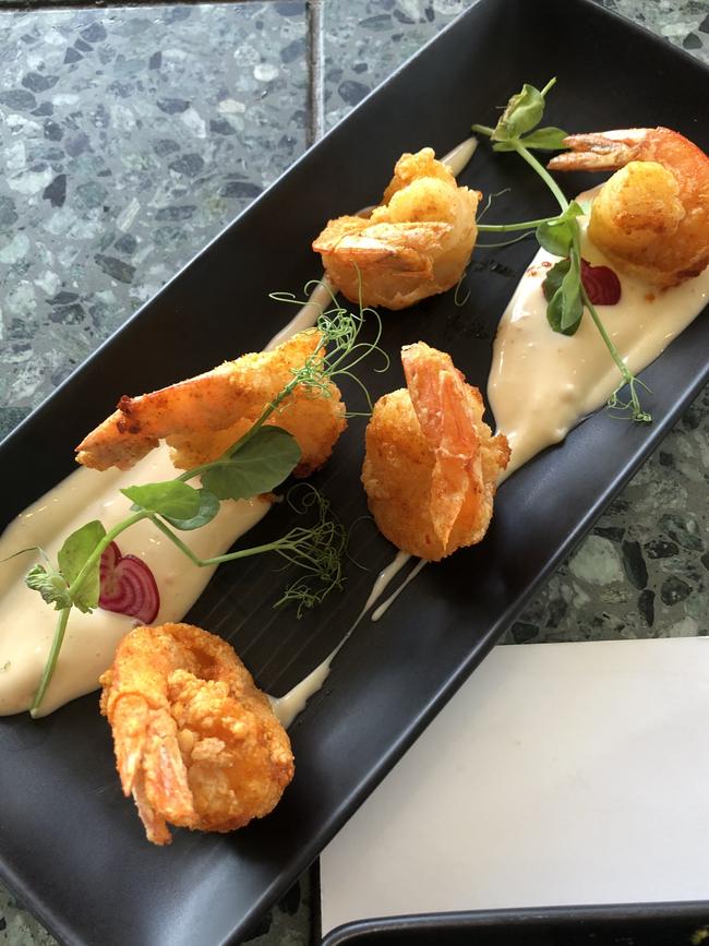 Crispy prawns with sweet lime aioli and lime caviar.