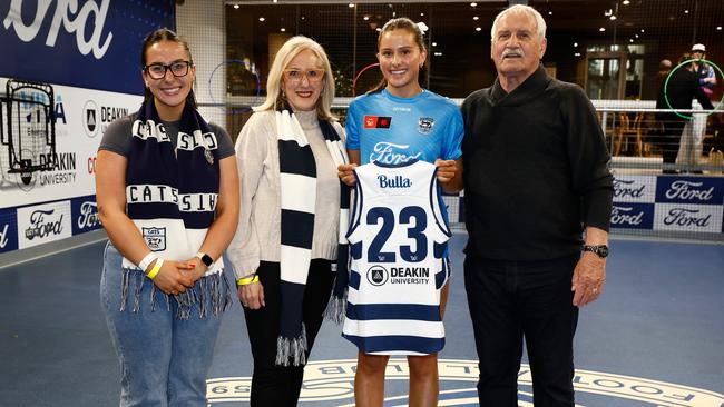 Geelong debutant Bryde O'Rourke poses with her sister Ireland, mother Marge and father Ray O'Rourke. Picture: Michael Willson/AFL Photos via Getty Images