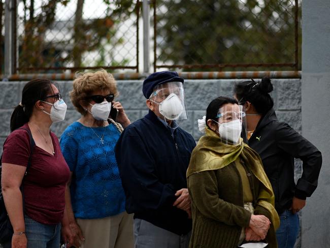 People queue to be inoculated with the Oxford/AstraZeneca vaccine against COVID-19. Picture: AFP