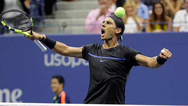 Rafael Nadal of Spain celebrates after winning his third round Men's Singles match.