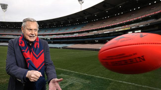 Finals are back the MCG. Football legend Ron Barassi is looking forward for his beloved Melbourne Demons to take home the 2022 Premiership Cup. Ron Barassi handballs a footy at the MCG.             Picture: David Caird