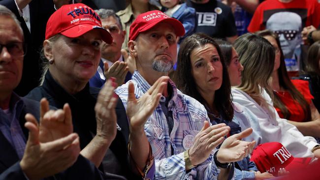 Laken Riley's parents Jason Riley (C) and Allyson Philips attend Donald Trump's campaign rally at the Forum River Center in March. Picture: Chip Somodevilla/Getty Images/AFP