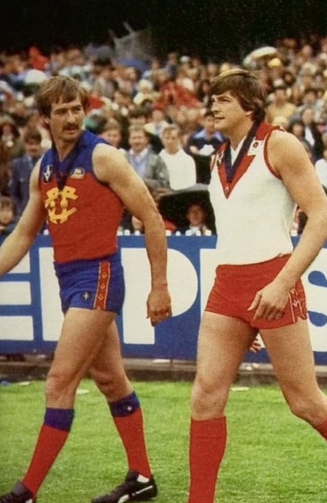 Bernie Quinlan and Barry Round with their 1981 Brownlow Medals.