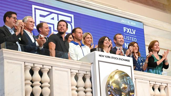 Darren Richman, Michael Raymond, Chris Payne, Mark Wahlberg, F45 Founder and CEO Adam Gilchrist, Luke Armstrong, Ruth Zukerman, and Liz Josefsberg attend as F45 Training rings the opening bell at the New York Stock Exchange in New York City. Picture: Getty Images.