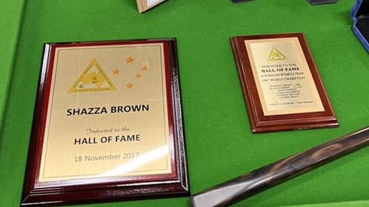 Trophies, shirts and achievements from Sharron Brown's eight ball career.