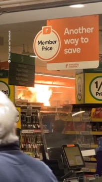 Shoppers flee as huge blaze rips through Woolies