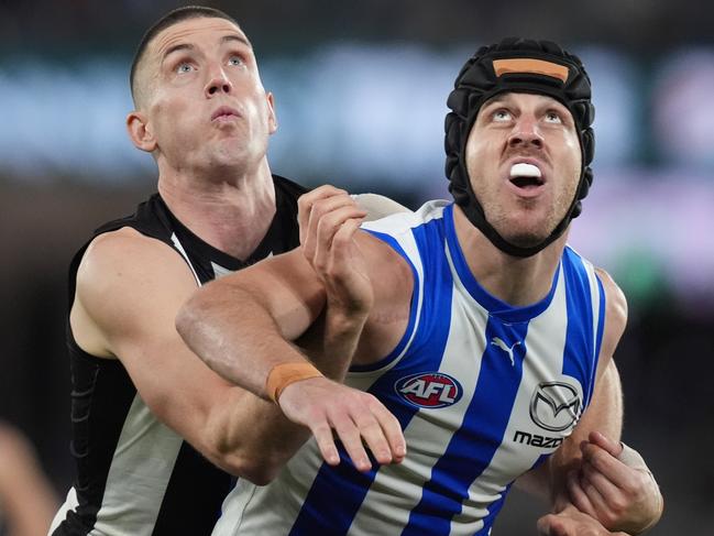 MELBOURNE, AUSTRALIA - JUNE 16: Tristan Xerri of the Kangaroos and Darcy Cameron of the Magpies contest the ruck during the round 14 AFL match between North Melbourne Kangaroos and Collingwood Magpies at Marvel Stadium, on June 16, 2024, in Melbourne, Australia. (Photo by Daniel Pockett/Getty Images)