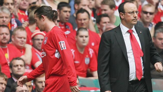 Harry Kewell (L) of Liverpool is substituted by manager Rafa Beneitez (C) during the FA Cup Final