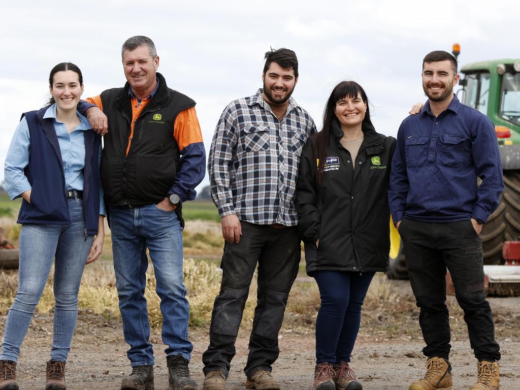 Griffith deputy mayor Glen and his wife Julie Andreazza, with their children, from left Teneeka, 20, Brendan, 23, and Daniel, 28. The family has been farming around Griffith since 1982. Picture: Jonathan Ng