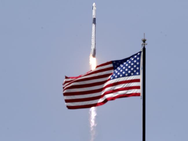 A SpaceX Falcon 9, with NASA astronauts Doug Hurley and Bob Behnken in the Dragon crew capsule. Picture: AP Photo/John Raoux