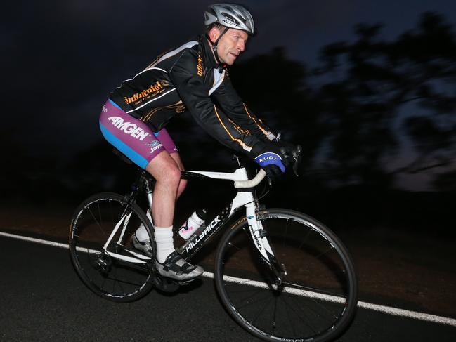 EXCLUSIVE PICS - PM Elect Tony Abbott going for his morning bike ride in Canberra. ( the first time in Canberra as PM Elect )