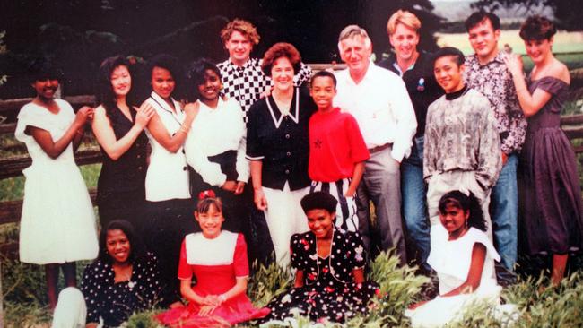 Shane Howard’s Tassie family including mum Pat and his late dad Bert, of Launceston, with some of their 16 adopted children, adopted from all around the world.