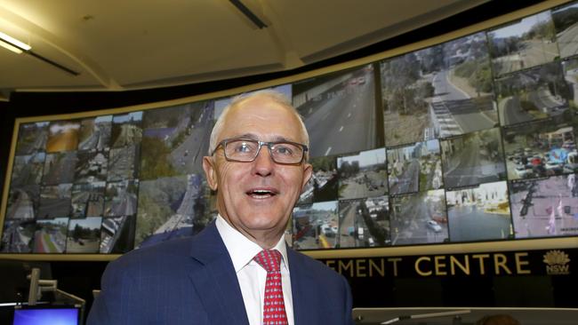 Prime Minister Malcolm Turnbull smiles during a visit to the Traffic Management Centre in Sydney, Friday, May 11, 2018. (AAP Image/Daniel Munoz) NO ARCHIVING