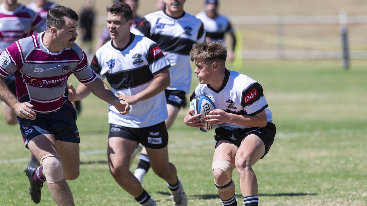 Toowoomba Bears player Sean Reed looks to tackle Ryan Balint of Warwick Water Rats in Downs Rugby Super Saturday B-grade semi-finals at Gold Park, Saturday, September 26, 2020. Picture: Kevin Farmer