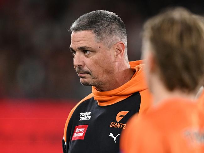 MELBOURNE, AUSTRALIA – MAY 11: Adam Kingsley, Senior Coach of the Giants speaks to the team during the round nine AFL match between Essendon Bombers and Greater Western Sydney Giants at Marvel Stadium, on May 11, 2024, in Melbourne, Australia. (Photo by Daniel Pockett/AFL Photos/via Getty Images)