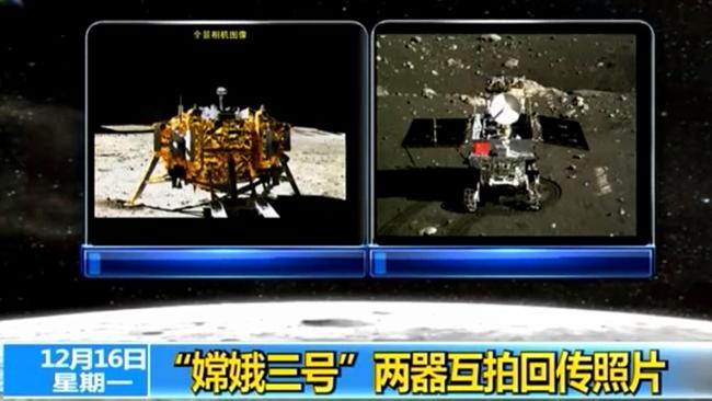 The Jade Rabbit moon rover, right, and the Chang'e-3 probe lander, left, taken by each other on December 15, 2013.