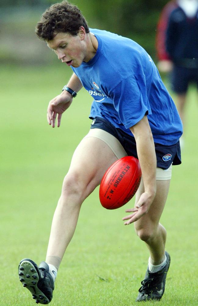 Lochlan Veale juggles the ball. Western Bulldogs training at Trinity College.