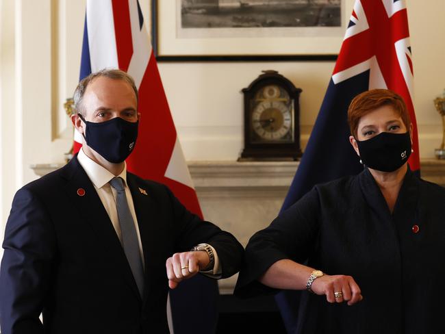 Britain's Foreign Secretary Dominic Raab (L) poses with Australia's Foreign minister Marise Payne on the sidelines of the G7 foreign ministers meeting in London.