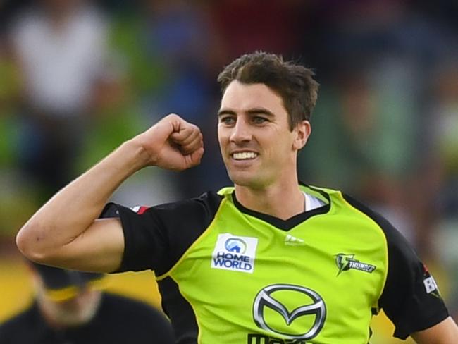 Pat Cummins of the Sydney Thunder (right) celebrates after dismissing D'Arcy Short of the Hobart Hurricanes during the Big Bash League (BBL) match between Sydney Thunder and Hobart Hurricanes at Manuka Oval in Canberra, Saturday, February 9, 2019. (AAP Image/Lukas Coch) NO ARCHIVING, EDITORIAL USE ONLY, IMAGES TO BE USED FOR NEWS REPORTING PURPOSES ONLY, NO COMMERCIAL USE WHATSOEVER, NO USE IN BOOKS WITHOUT PRIOR WRITTEN CONSENT FROM AAP