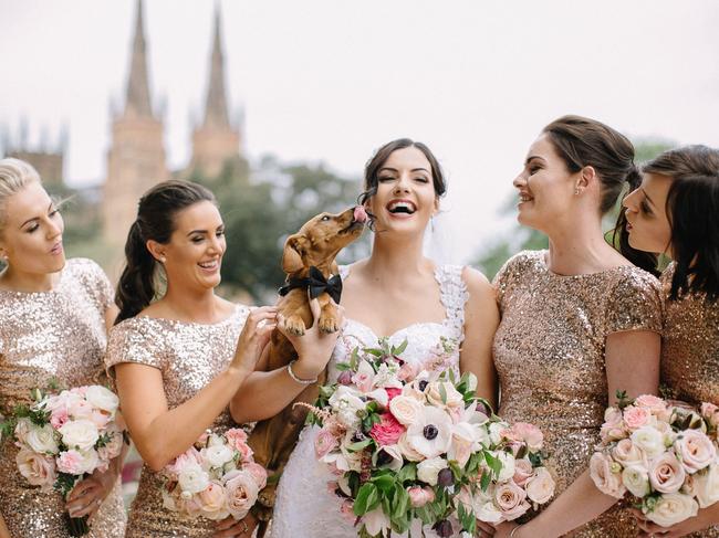 Jodie Nixon with her bridesmaids and dog Hunter the sausage dog on wedding day in 2016. Picture: Clarzzique