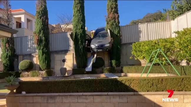 Elderly couple crash into Rostrevor fence (7News)