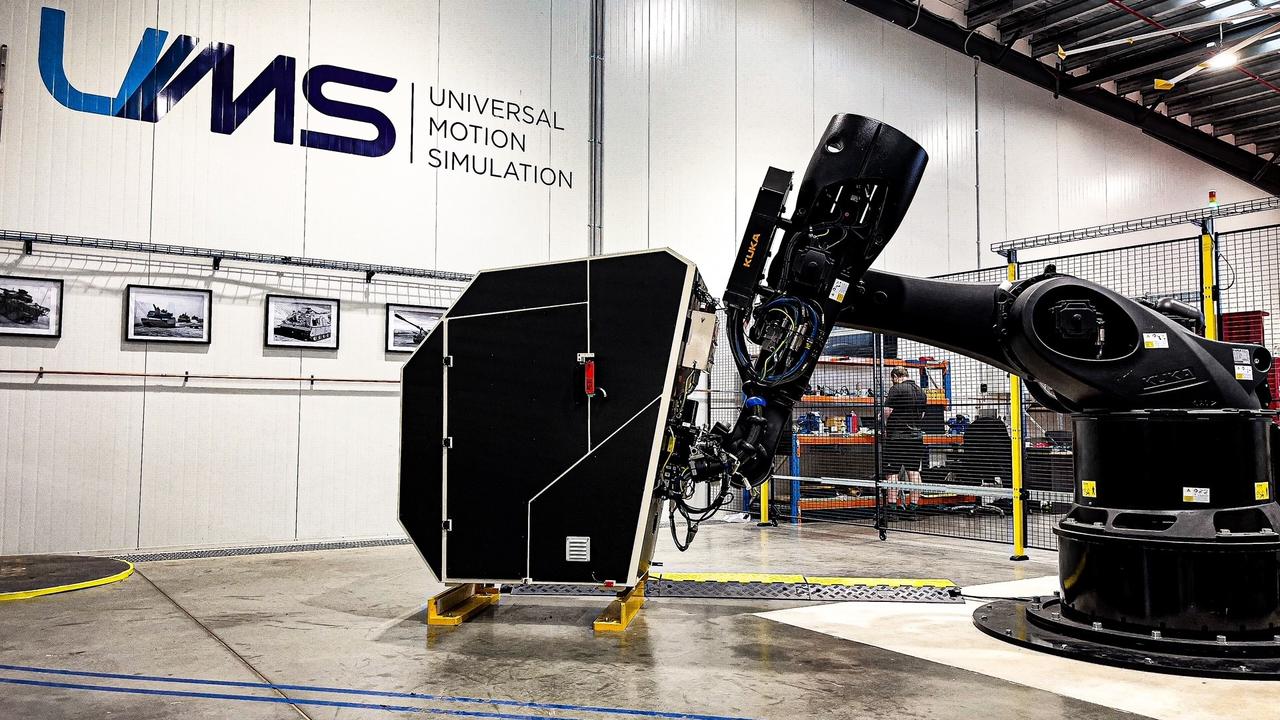 Universal Motion Simulation’s technology involves a armoured vehicle “cabin” connect to a robotic arm.