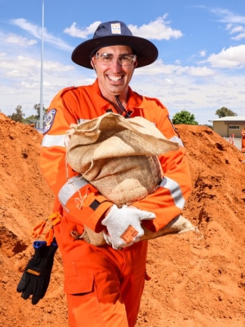 Paul DePassos sandbagging in the Riverland.