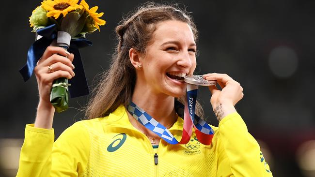 TOKYO, JAPAN – AUGUST 07: Nicola McDermott of Team Australia poses with the silver medal for the Women's High Jump Final on day fifteen of the Tokyo 2020 Olympic Games at Olympic Stadium on August 07, 2021 in Tokyo, Japan. (Photo by Matthias Hangst/Getty Images)