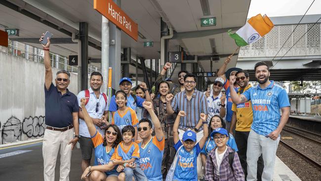 Fans gather at Harris Park for the train to the SCG. Picture: Monique Harmer