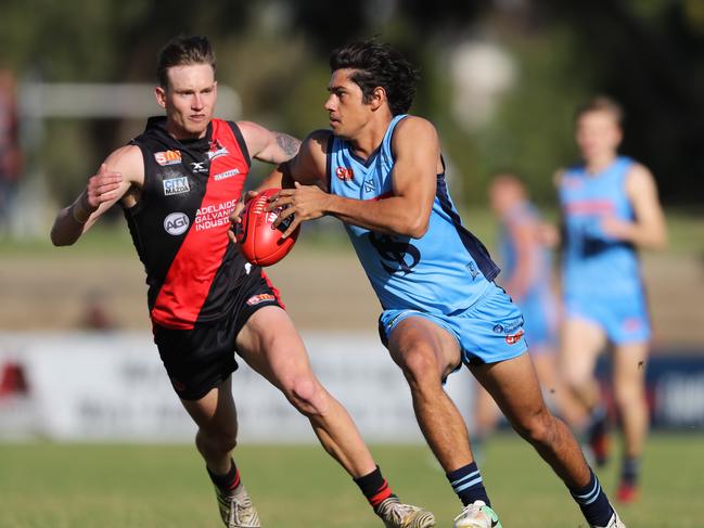 Sturt AFL draft prospect Shane McAdam evades West Adelaide’s Errin Wasley-Black earlier this season. Picture Matt Turner.