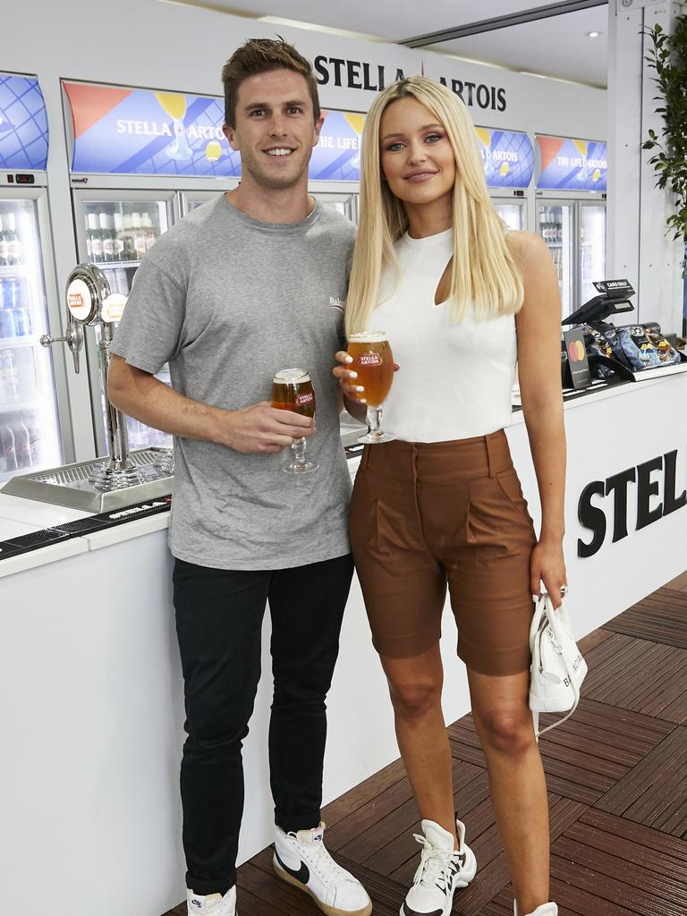 AFL WAG Jessie Murphy shows off her toned legs in a short black jumpsuit at  a launch