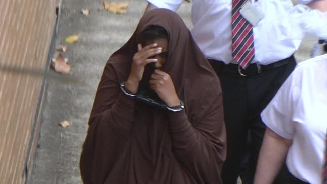 Zainab Abdirahman-Khalif is led into court for an earlier apperance. Picture: Nine News